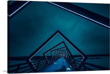  “High Trestle Trail Bridge, Madrid, Iowa” is a mesmerizing print that captures the enigmatic allure of this architectural masterpiece. As nightfall drapes the landscape, illuminating lines trace the bridge, casting an ethereal glow that dances against the serene backdrop of the sky. Every angle and curve is accentuated by ambient lighting, inviting viewers into a world where nature and human ingenuity converge in harmonious existence.