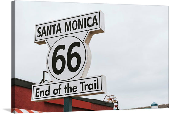 “Santa Monica 66 End of the Trail” is a captivating artwork that captures a piece of American history, marking the terminus of the legendary Route 66. The stark contrast between the bold, black numerals and the pristine white background encapsulates a journey of discovery, freedom, and adventure.