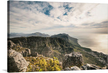  “The Table Mountain, Cape Town, South Africa” is a mesmerizing print that transports you to the pinnacle of natural wonder. From its rugged cliffs to the lush greenery that clings tenaciously, every detail is etched with precision. The expansive skies above stretch out endlessly, inviting you to lose yourself in their vastness.