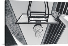  “Basketball Under the Overpass” by Ian Simmonds is a captivating piece that marries the raw, urban energy of street basketball with the architectural grace of city infrastructure. The monochromatic tones highlight the stark contrast between the geometric precision of the overpass and the organic, fluid motion encapsulated in every bounce of a basketball. 