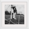 "Male goalkeeper standing by the goal"