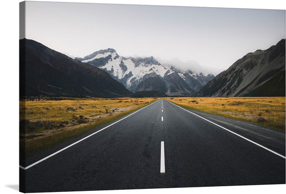 This print captures the stunning beauty of Mount Cook, New Zealand. The image showcases the majestic mountains and the winding road that leads to it. The colors are vibrant and the composition is perfect. This print would make a great addition to any home or office.