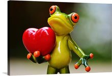  Dive into a world where whimsy and warmth converge with “Frog with Heart”. This enchanting print captures a vibrant, green frog, its eyes wide and full of wonder, as it tenderly holds a glossy red heart in its delicate hands. Every brushstroke brings this charming creature to life, making it a captivating addition to any space. 