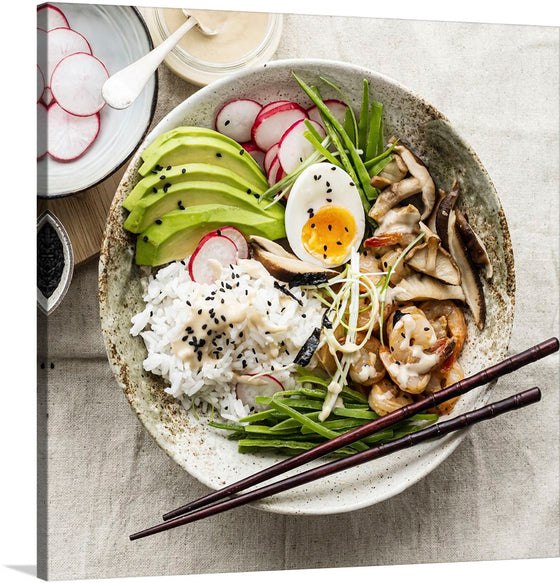 This print is a stunning photograph of a bowl of rice, avocado, shrimp, mushrooms, and hard-boiled eggs. The rice is white and fluffy, topped with a variety of colorful and flavorful ingredients. The avocado is green and creamy, and it is sliced into thick wedges. The shrimp are pink and plump, and they are cooked to perfection.