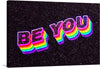 This vibrant and colorful print is a bold reminder to always be yourself. The words “BE YOU” pop off the page in a rainbow spectrum, radiating positivity and self-expression. Against a starry black background, this digital art piece invites you to embrace your uniqueness. Hang it on your wall, and let its uplifting message infuse your space with joy and authenticity. 