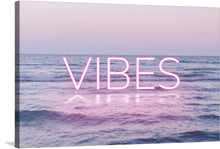  Immerse yourself in the tranquil ambiance of this exquisite artwork, “VIBES”. Every print captures the serene dance of gentle waves under a pastel sky, evoking a sense of calm and harmony. The neon “VIBES” inscription adds a contemporary touch, making it a perfect blend of natural beauty and modern aesthetics. 