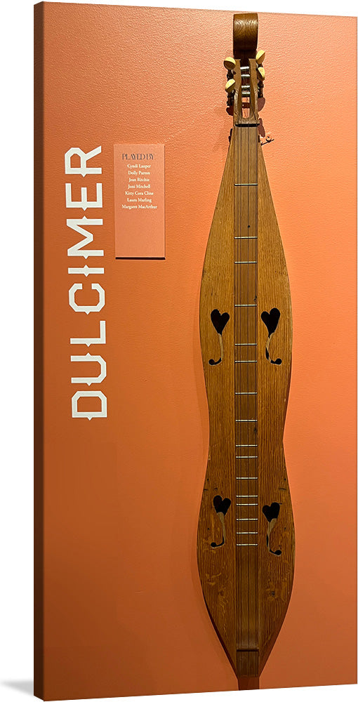 “Dulcimer” is a beautiful print of a traditional stringed instrument. The print showcases the instrument’s unique shape and intricate details, making it a perfect addition to any music lover’s collection.