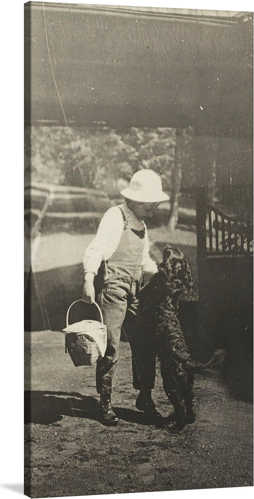 Experience the timeless charm of “Elizabeth and Inky” by Alfred Stieglitz. This black and white photograph captures a heartwarming moment between a young girl and her dog, embodying the innocence of childhood and the special bond between a child and their pet.