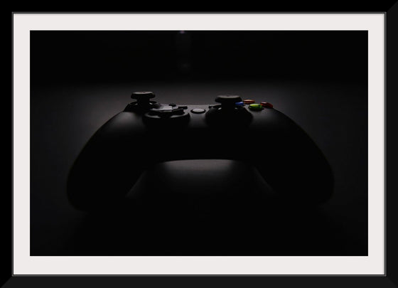 "A Dark Background Photograph of an Xbox Controller"