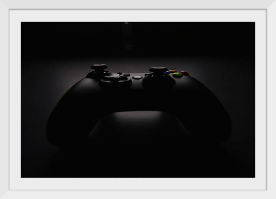 "A Dark Background Photograph of an Xbox Controller"