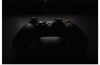 "A Dark Background Photograph of an Xbox Controller"