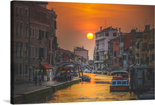  “Sunset in Venice, Italy” is a mesmerizing print that transports you to the romantic waterways of this iconic city. As the sun bids farewell, it casts a warm, golden glow upon the historic Venetian architecture. The canal, lined with elegant buildings, reflects the sky’s hues, creating a harmonious dance of light and water. Boats gently sway, and people stroll along the walkways, savoring the enchanting view. 