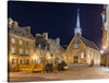 Wilfredo Rafael Rodriguez Hernandez’s “Place Royale at Night, Vieux-Québec, Quebec Ville, Canada” is a stunning print that captures the essence of a historic square under the gentle embrace of nightfall. The cobblestone paths, illuminated by the soft glow of street lamps, invite you on a tranquil journey through time. 