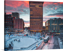  “Place D’Youville, Québec, Canada” by Wilfredo Rafael Rodriquez Hernandez. This mesmerizing print captures a serene yet vibrant winter evening, where the city’s architectural elegance meets nature’s colorful canvas. The sky, painted with hues of sunset, casts a warm glow on the snow-covered landscape and illuminates the city’s iconic structures. 