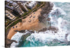 “Durban, South Africa” is a breathtaking print that captures the stunning beauty of Durban’s coastline. This aerial photograph showcases the vibrant blue waters meeting the sandy beach, creating a mesmerizing contrast that is sure to captivate any viewer. 