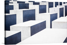  Immerse yourself in the profound silence and solemn beauty of our exclusive print, “Remember the names - Berlin, Germany.” Each concrete slab, captured with exquisite detail, stands as a silent testament to the lives lost, evoking deep reflection and remembrance. The stark geometry and the play of light and shadow invite viewers into a space of contemplation, where history’s echoes are both a solemn warning and a call to never forget. 