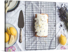  “Freshly Baked Lemon Cake with Icing and Lavender Flowers” is a delightful print that captures the essence of a freshly baked cake. The artwork features a golden-brown crust and luscious icing dripping gracefully down the sides, captured with exquisite clarity. 