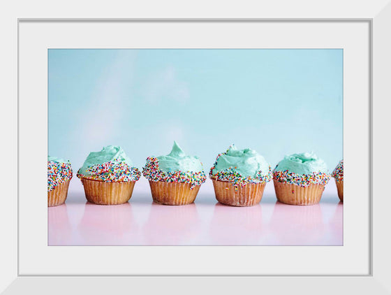 "Blue Frosting Cupcakes and Rainbow Sprinkles"