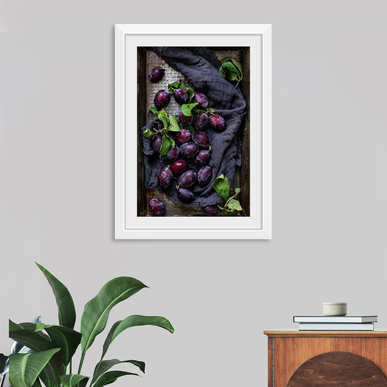 "Closeup of fresh plums on a tray", Monika Grabkowska