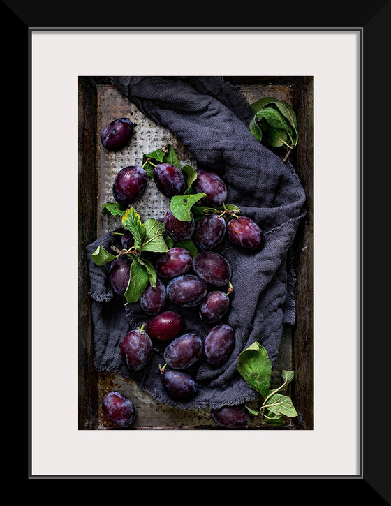 "Closeup of fresh plums on a tray", Monika Grabkowska