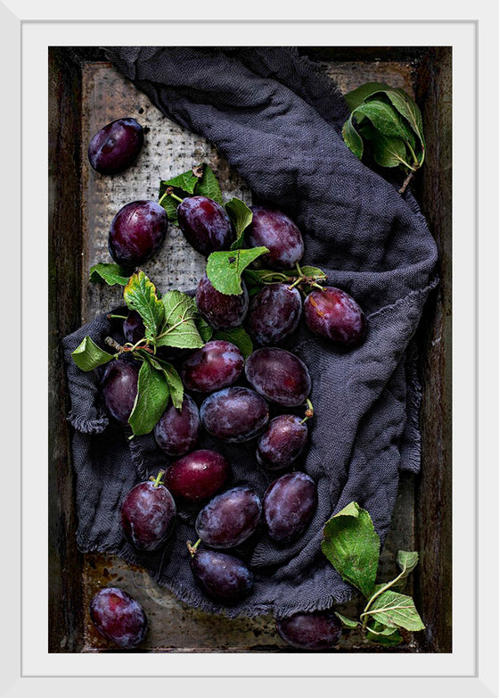 "Closeup of fresh plums on a tray", Monika Grabkowska