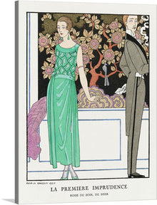  “La premiere imprudence: Robe du soir, de Beer (1921)” is a striking artwork by George Barbier that captures the elegance of early 20th-century fashion. The piece features two figures, one adorned in a vibrant green evening gown and holding a pink feathered fan, the other in a classic black suit. They stand next to a white structure, possibly a balcony, adding a sense of depth to the scene. The background showcases an intricate floral pattern in gold, red, and black, enhancing the overall aesthetic appeal. 