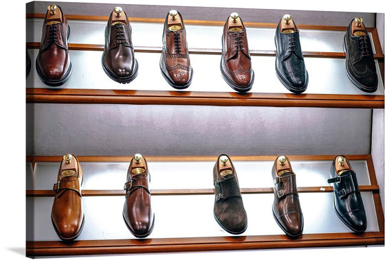 Adorn your space with a print that encapsulates the epitome of elegance and style, featuring an array of meticulously crafted leather shoes showcased on wooden shelves. Each pair, from the polished brown oxfords to the classic black monk straps, tells a story of craftsmanship, offering not just footwear but a journey into a world where tradition meets contemporary fashion.