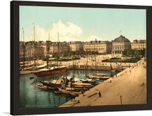  Step back in time with this exquisite print of “The Place Gambetta and Docks, Havre, France”. Every detail, from the majestic sailing vessels moored at the dock to the grandeur of the architectural masterpieces lining the streets, is captured with stunning clarity. The serene atmosphere and vibrant energy of a bygone era are immortalized in this artwork. 