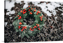  Immerse yourself in the serene beauty of winter with this exquisite print. A lush green wreath adorned with vibrant red berries lies gracefully upon a delicate frost-kissed foliage, evoking the silent, magical moments of a snowy day. Every detail, from the intricate patterns of the frozen plants to the rich colors of the wreath, is captured with stunning clarity. This artwork is not just a print but an experience of winter’s tranquil beauty, bringing nature’s touch to your space. 