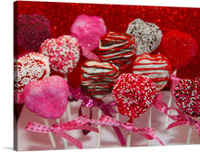  This captivating print features a collection of heart-shaped treats, each meticulously adorned with sprinkles, drizzles, and glitter. The radiant red backdrop enhances the visual appeal of these confectionery masterpieces, making the artwork a vibrant and delightful visual feast. Each treat, mounted on a stick wrapped with pink ribbons, exudes an atmosphere of love and celebration. 