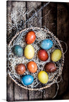 “Colored Easter Eggs in a basket” by Monika Grabkowska is a beautiful print that captures the essence of Easter. The colorful eggs nestled in a basket with straw make for a perfect addition to your home decor during the holiday season. 