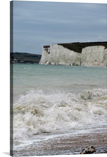  This print features a stunning photograph of the iconic white cliffs of the English Channel.  The image captures the natural beauty of the cliffs and the sea, making it a perfect addition to any home or office. Birling Gap is a coastal hamlet in the Seven Sisters chalk cliffs, located in East Sussex, England. 