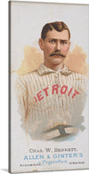 This rare and iconic baseball trade card from 1887 features Charles W. Bennett, a versatile and talented player who was a key member of the World Champion Detroit Wolverines. Bennett is shown in his Wolverines uniform. He has a determined expression on his face and is clearly ready to take the field.