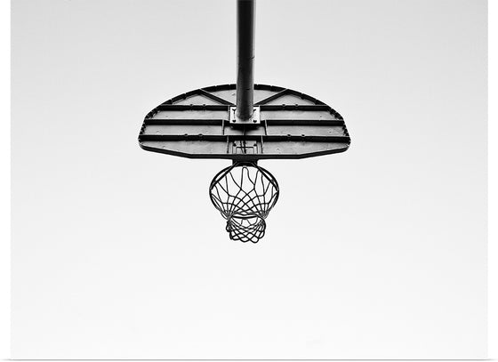 "Below an outdoor basket ball net", MontyLov