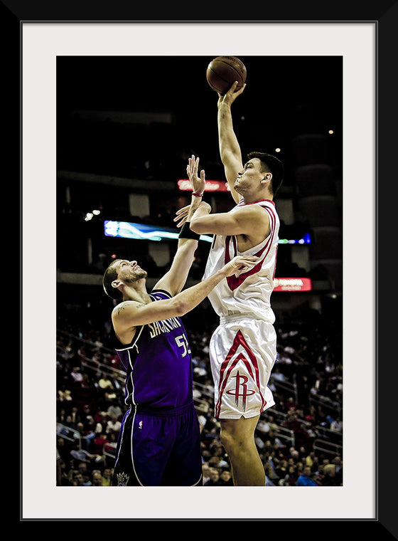 "Yao Ming shooting over Brad Miller"