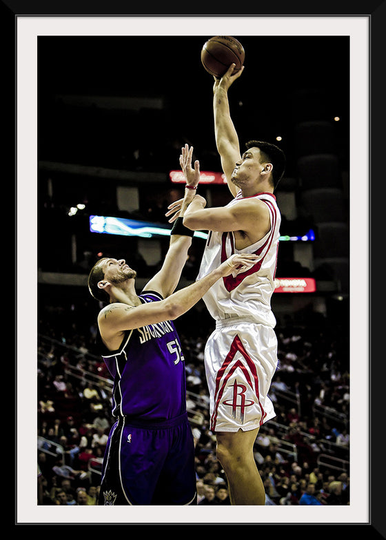 "Yao Ming shooting over Brad Miller"