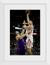 "Yao Ming shooting over Brad Miller"