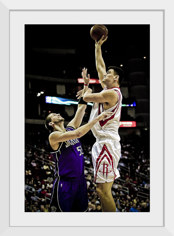 "Yao Ming shooting over Brad Miller"