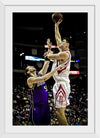 "Yao Ming shooting over Brad Miller"