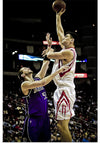 "Yao Ming shooting over Brad Miller"