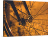 “Bicycle Wheel” by Pietro De Grandi invites you to explore the captivating essence of simplicity. In this exquisite print, the intricate interplay of light and shadow dances upon the delicate spokes and sturdy hub of a classic bicycle wheel. Each line and curve whispers of timeless elegance, merging artistry and engineering. 