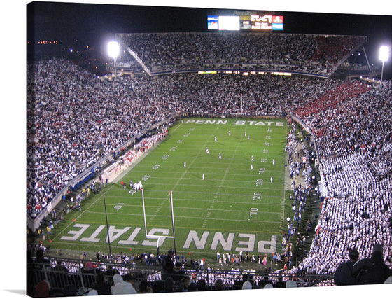 Capture the electrifying atmosphere of a Penn State football game with this stunning print of the iconic stadium, brimming with fans adorned in white and blue. Every inch of this artwork pulsates with the energy and passion synonymous with college football. 