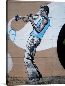  “Graffiti en Ormaiztegi” is a captivating print that brings the vibrant energy of street art into your space. The artwork features a musician engrossed in the harmonious melodies of a trumpet, captured in a dynamic graffiti style. 