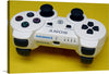 Dive into the world of gaming with this iconic print of a classic PlayStation controller. Every detail, from the vibrantly colored buttons to the ergonomic design, is captured in high resolution, bringing a piece of the interactive entertainment universe into your space. Whether you’re a seasoned gamer or simply appreciate the artistry of well-designed tech, this print promises to be a conversation starter and a nostalgic nod to countless hours of gaming adventures. 