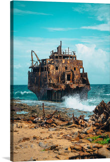  “Old Ship” captures the haunting beauty of a shipwreck, a testament to the relentless dance between man-made marvels and nature’s might. The rusted, abandoned vessel stands as a solemn sentinel against the backdrop of an azure sky and tumultuous sea. Every crack, every rust stain tells a story of voyages past, battles with the elements, and ultimately, surrender to the eternal embrace of the ocean. 