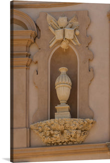   “Palacio de Bibataubin detail right facade Granada Spain” by Jebulon. This exquisite print captures a detailed carving on the iconic palace, showcasing masterful craftsmanship and artistic elegance. The warm tones of the stone, highlighted by the soft play of light and shadow, bring a sense of timeless grandeur to any space.