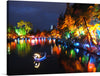 “Festival of Lights, New Plymouth, New Zealand” is a stunning print that captures the beauty and magic of the annual event. The vibrant colors and reflections on the water create a mesmerizing scene that is sure to captivate any viewer. This print would make a great addition to any art collection or as a statement piece in a home or office.