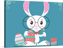  The Easter Bunny is a beloved symbol of the Easter holiday. This playful and colorful print features a cute bunny with glasses painting an Easter egg. The bunny is sitting on its hind legs and is holding a paintbrush in its right paw. The bunny is painting a large Easter egg with a red and blue pattern.