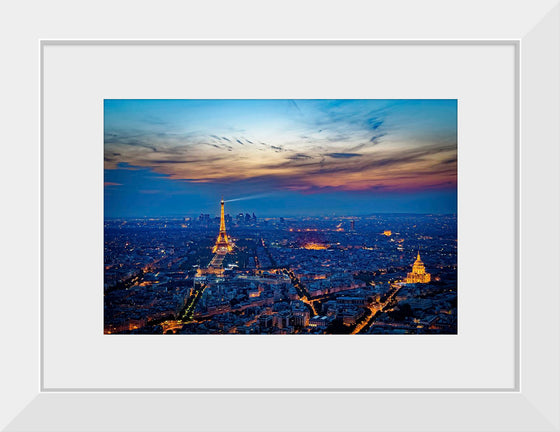 "Eiffel Tower and Paris Cityscape at Night"