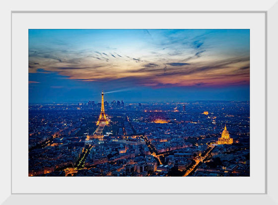 "Eiffel Tower and Paris Cityscape at Night"